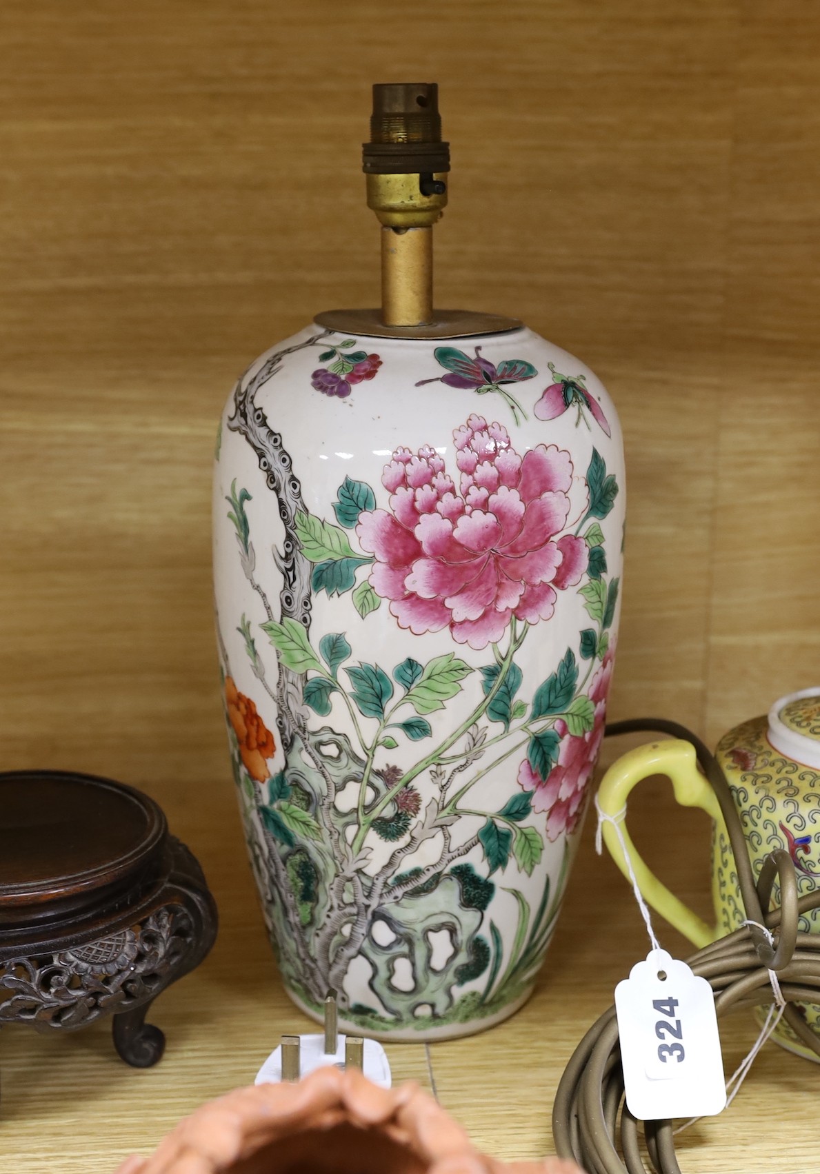 A late 19th century Chinese famille rose lamp (cut down) and other Chinese and Japanese ceramics and miscellaneous items